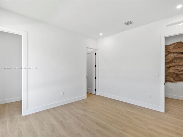 1735 SW 24th Ter, Miami, FL 33145 - spare room with light wood-type flooring, recessed lighting, and baseboards