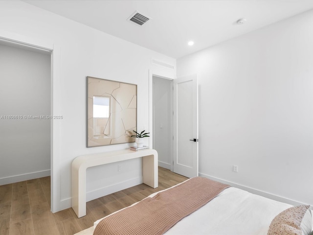 1735 SW 24th Ter, Miami, FL 33145 - bedroom featuring baseboards, light wood finished floors, and recessed lighting