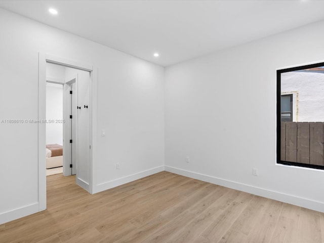 1735 SW 24th Ter, Miami, FL 33145 - empty room featuring light wood finished floors, baseboards, and recessed lighting
