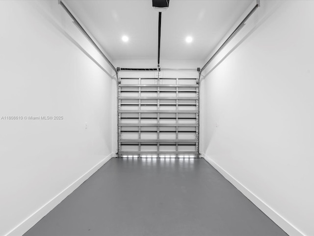 1735 SW 24th Ter, Miami, FL 33145 - garage with baseboards, recessed lighting, and a garage door opener