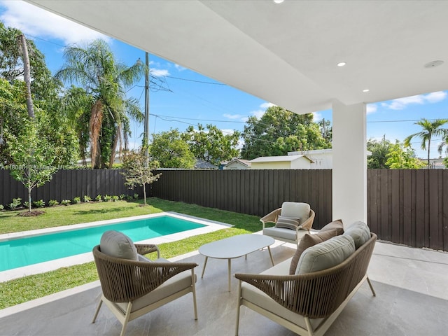 1735 SW 24th Ter, Miami, FL 33145 - view of swimming pool with a patio and an outdoor hangout area