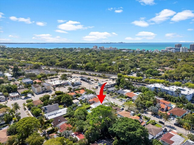 1735 SW 24th Ter, Miami, FL 33145 - drone / aerial view of a large body of water and a tree filled landscape