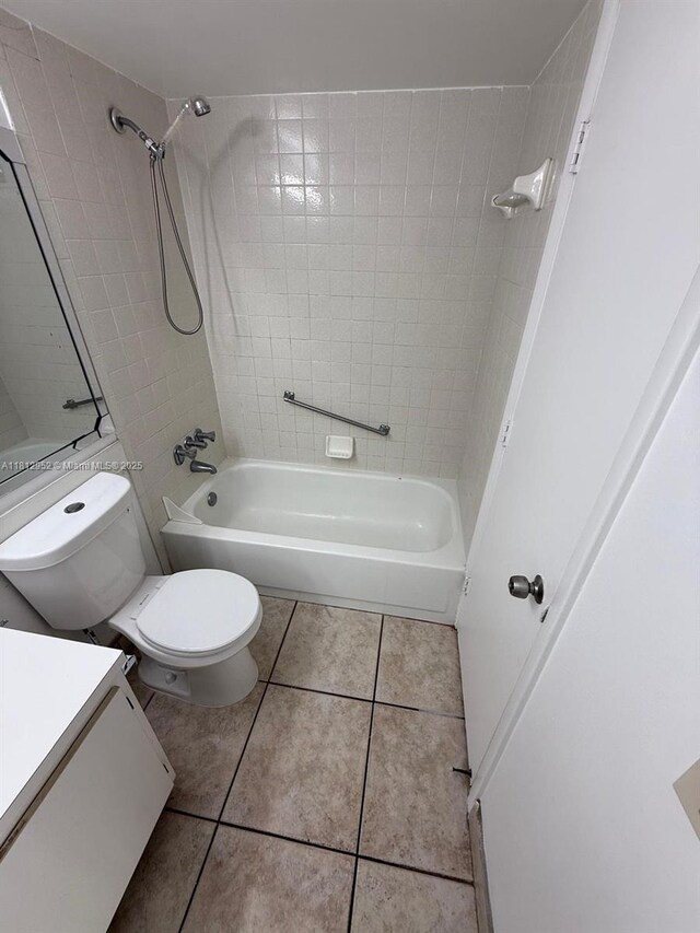 721 Sunny Pine Way Unit D2, Green Acres, FL 33415 - full bathroom with tub / shower combination, vanity, tile patterned flooring, and toilet