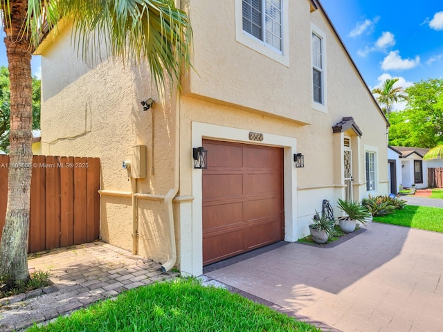 6566 NW 197th Ln, Hialeah, FL 33015 - garage featuring driveway