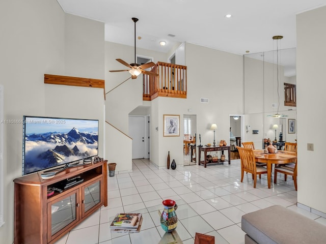 6566 NW 197th Ln, Hialeah, FL 33015 - living room featuring ceiling fan, a towering ceiling, light tile patterned floors, and recessed lighting
