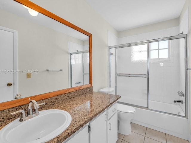 6566 NW 197th Ln, Hialeah, FL 33015 - full bath featuring toilet, vanity, tile patterned flooring, and enclosed tub / shower combo