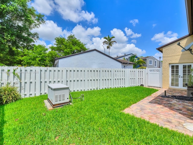 6566 NW 197th Ln, Hialeah, FL 33015 - view of yard featuring french doors and a patio area