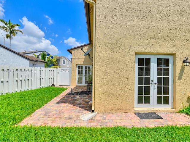 6566 NW 197th Ln, Hialeah, FL 33015 - view of yard with french doors and a patio area