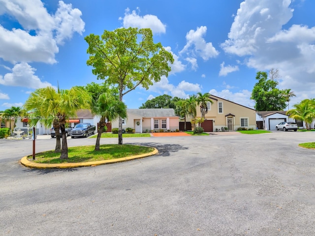 6566 NW 197th Ln, Hialeah, FL 33015 - view of front of house featuring stucco siding and a residential view