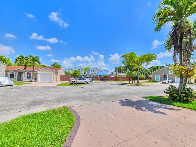 6566 NW 197th Ln, Hialeah, FL 33015 - view of street featuring a residential view