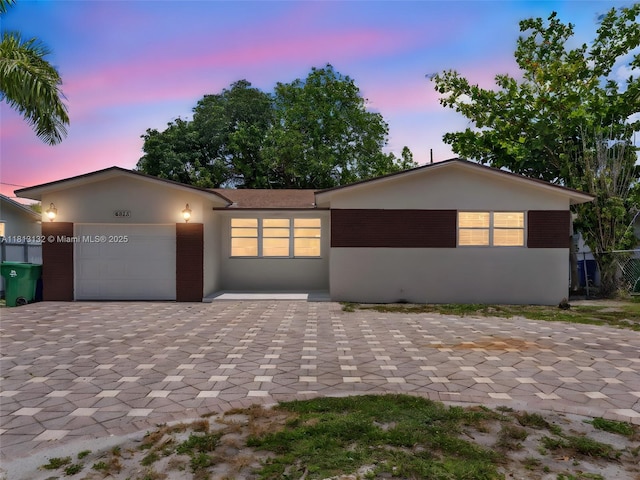6525 SW 18th St, Miramar, FL 33023 - single story home with driveway, stucco siding, and a garage