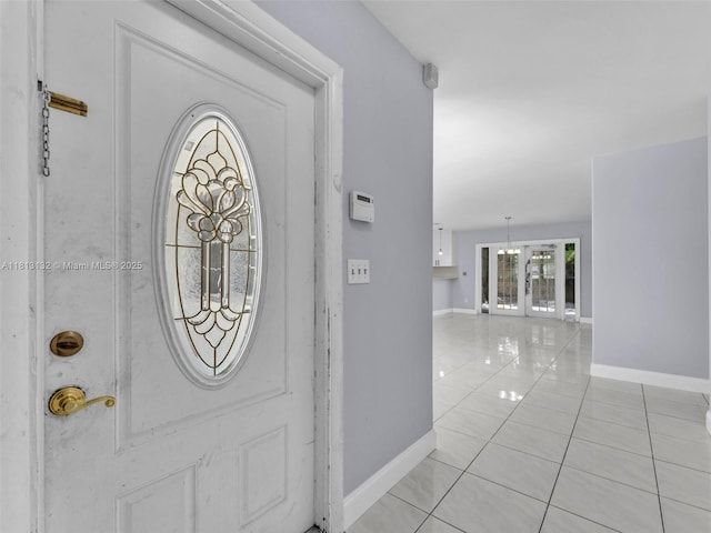6525 SW 18th St, Miramar, FL 33023 - entrance foyer with baseboards and light tile patterned floors