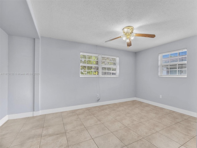 6525 SW 18th St, Miramar, FL 33023 - spare room featuring a textured ceiling, a ceiling fan, baseboards, and tile patterned flooring