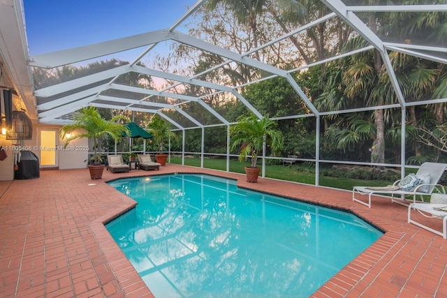 7395 SW 166th St, Palmetto Bay, FL 33157 - outdoor pool featuring a patio and a lanai