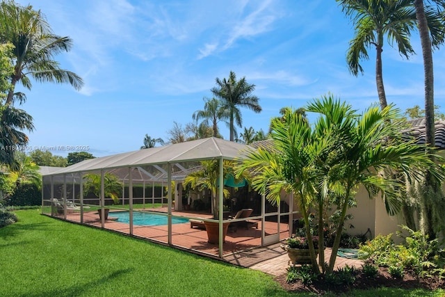 7395 SW 166th St, Palmetto Bay, FL 33157 - outdoor pool with a lawn, a patio, and a lanai