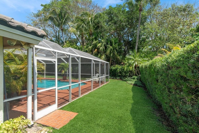 7395 SW 166th St, Palmetto Bay, FL 33157 - view of grassy yard with an outdoor pool