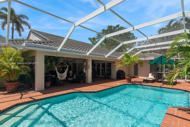 7395 SW 166th St, Palmetto Bay, FL 33157 - swimming pool featuring a patio area and a lanai