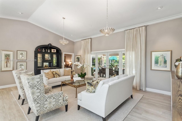 7395 SW 166th St, Palmetto Bay, FL 33157 - living area featuring baseboards, ornamental molding, light wood-type flooring, french doors, and high vaulted ceiling