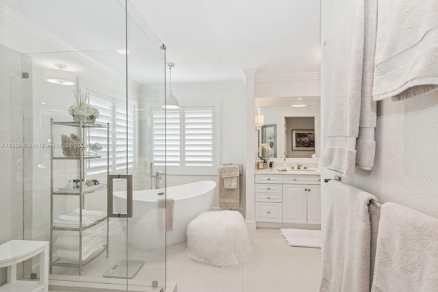 7395 SW 166th St, Palmetto Bay, FL 33157 - bathroom with vanity, a freestanding tub, a shower stall, tile patterned flooring, and ornamental molding