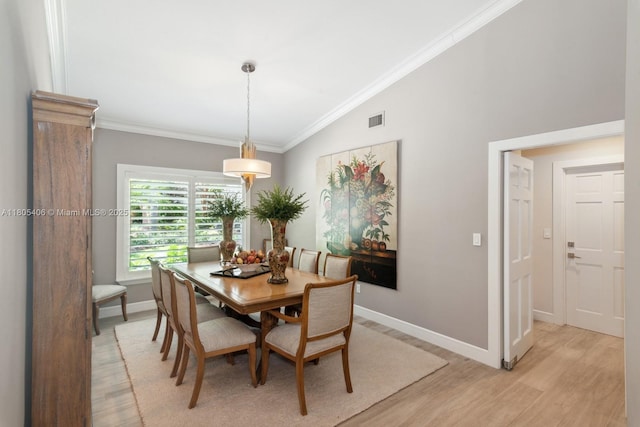7395 SW 166th St, Palmetto Bay, FL 33157 - dining room with light wood-style floors, baseboards, crown molding, and vaulted ceiling
