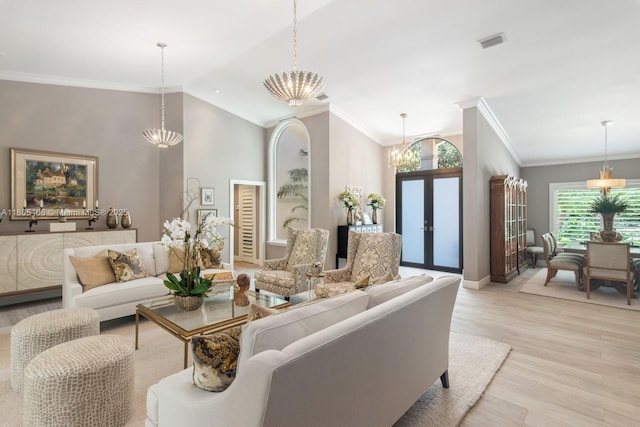 7395 SW 166th St, Palmetto Bay, FL 33157 - living area featuring a chandelier, light wood-type flooring, baseboards, lofted ceiling, and crown molding