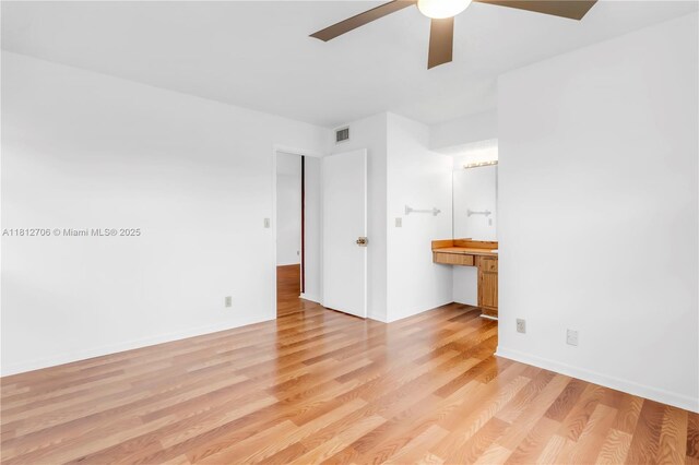 9906 Twin Lakes Dr Unit 7-I, Coral Springs, FL 33071 - unfurnished room with light wood-style floors and a ceiling fan