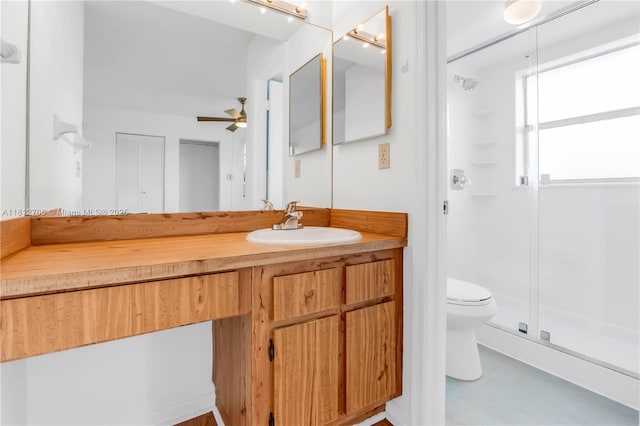 9906 Twin Lakes Dr Unit 7-I, Coral Springs, FL 33071 - bathroom featuring toilet, a shower stall, a ceiling fan, vanity, and tile patterned floors