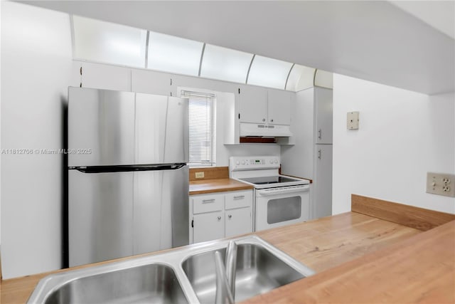 9906 Twin Lakes Dr Unit 7-I, Coral Springs, FL 33071 - kitchen featuring freestanding refrigerator, white range with electric cooktop, under cabinet range hood, a sink, and white cabinetry
