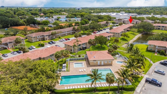 9906 Twin Lakes Dr Unit 7-I, Coral Springs, FL 33071 - aerial view of a pool and a large body of water