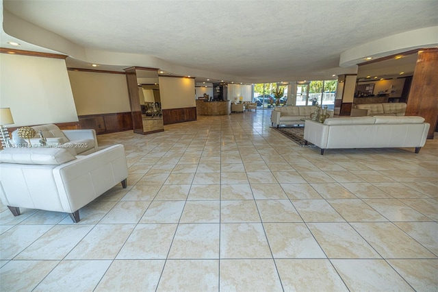 2841 N Ocean Blvd Unit 1801, Fort Lauderdale, FL 33308 - lobby with wainscoting, recessed lighting, and a textured ceiling