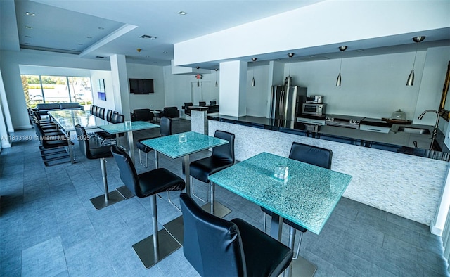 2841 N Ocean Blvd Unit 1801, Fort Lauderdale, FL 33308 - kitchen with a sink, stainless steel appliances, and open floor plan