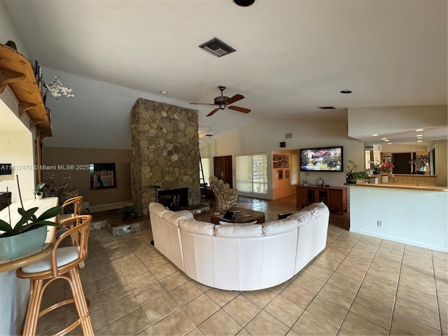 5790 SW 37th Ter, Dania Beach, FL 33312 - living area with a fireplace, lofted ceiling, light tile patterned floors, and a ceiling fan