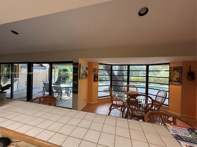 5790 SW 37th Ter, Dania Beach, FL 33312 - tiled dining room featuring baseboards and recessed lighting