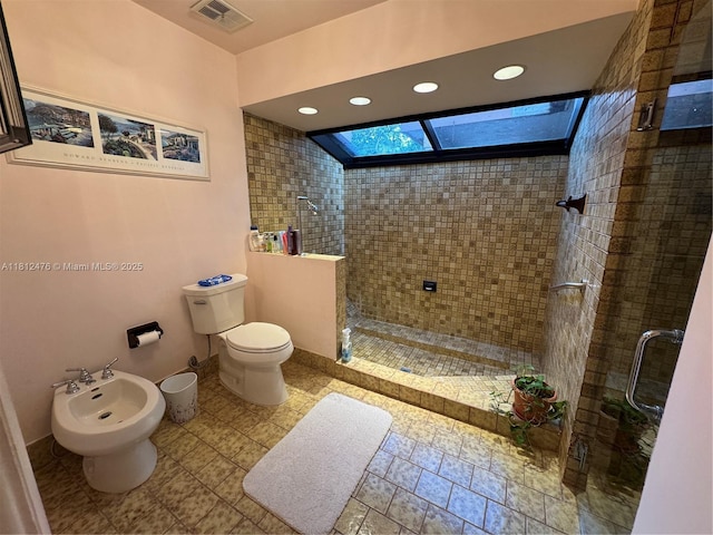 5790 SW 37th Ter, Dania Beach, FL 33312 - bathroom with a shower stall, toilet, a bidet, and recessed lighting