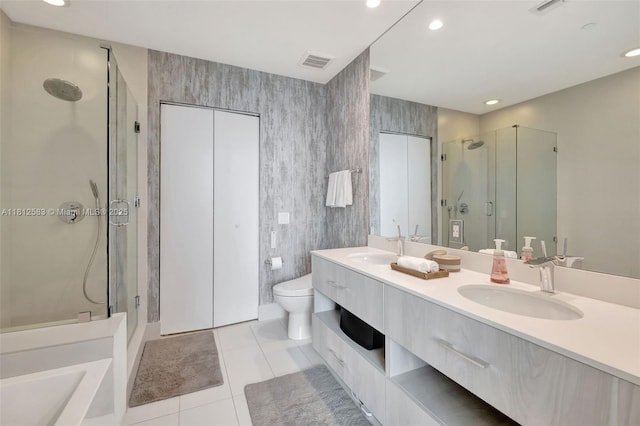 501 NE 31st St Unit Ph4302, Miami, FL 33137 - full bathroom with a stall shower, double vanity, tile patterned flooring, toilet, and recessed lighting