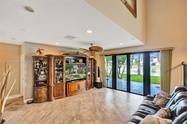 4946 SW 166th Ave, Miramar, FL 33027 - living room featuring a ceiling fan and recessed lighting