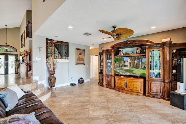 4946 SW 166th Ave, Miramar, FL 33027 - living area featuring ceiling fan, french doors, recessed lighting, baseboards, and stairway