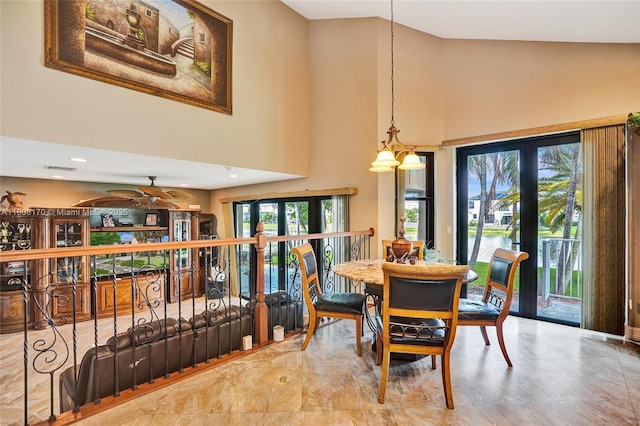 4946 SW 166th Ave, Miramar, FL 33027 - dining space featuring a towering ceiling, ceiling fan, and french doors