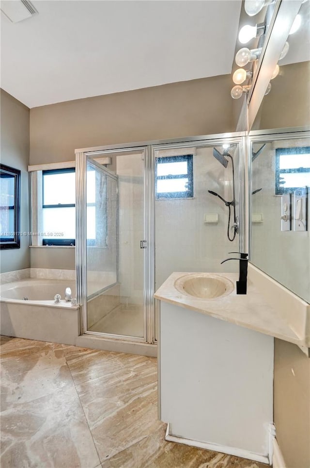 4946 SW 166th Ave, Miramar, FL 33027 - full bath featuring vanity, a garden tub, and a stall shower