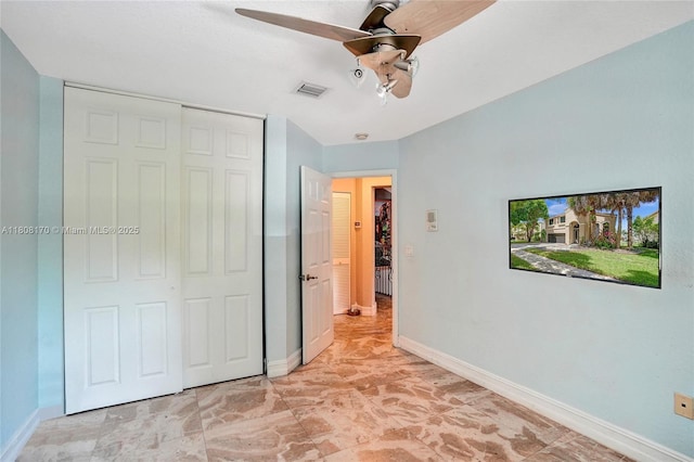 4946 SW 166th Ave, Miramar, FL 33027 - unfurnished bedroom featuring a closet, baseboards, and ceiling fan