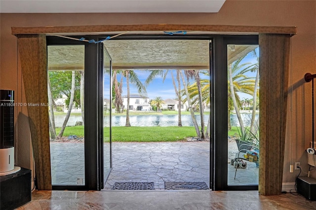 4946 SW 166th Ave, Miramar, FL 33027 - doorway featuring a water view and healthy amount of natural light
