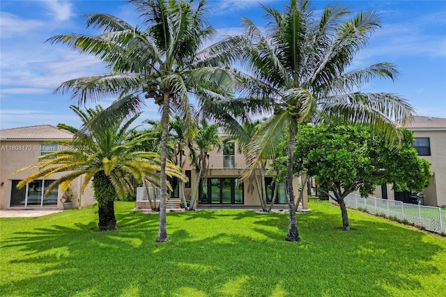 4946 SW 166th Ave, Miramar, FL 33027 - rear view of house with stucco siding and a balcony