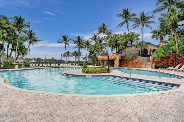 4946 SW 166th Ave, Miramar, FL 33027 - community pool featuring stairs and a patio