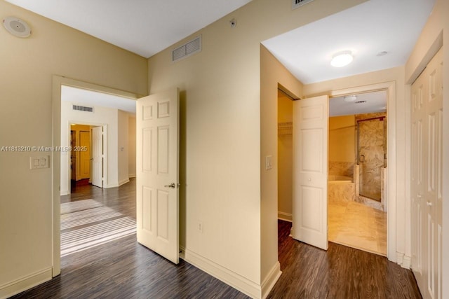 510 NW 84th Ave Unit 541, Plantation, FL 33324 - corridor with dark wood-style flooring and baseboards