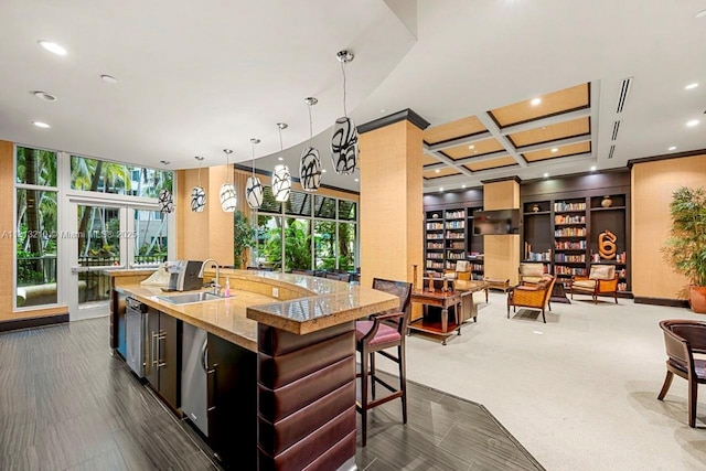 510 NW 84th Ave Unit 541, Plantation, FL 33324 - kitchen featuring a sink, a large island, healthy amount of natural light, recessed lighting, and decorative light fixtures