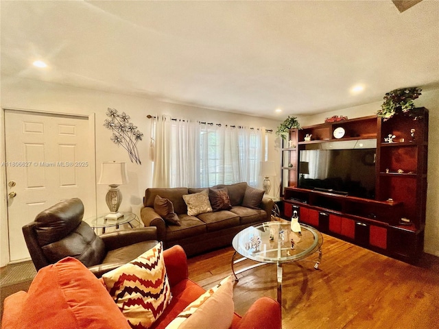 2465 NE 15th Ave, Pompano Beach, FL 33064 - living area with wood finished floors and recessed lighting