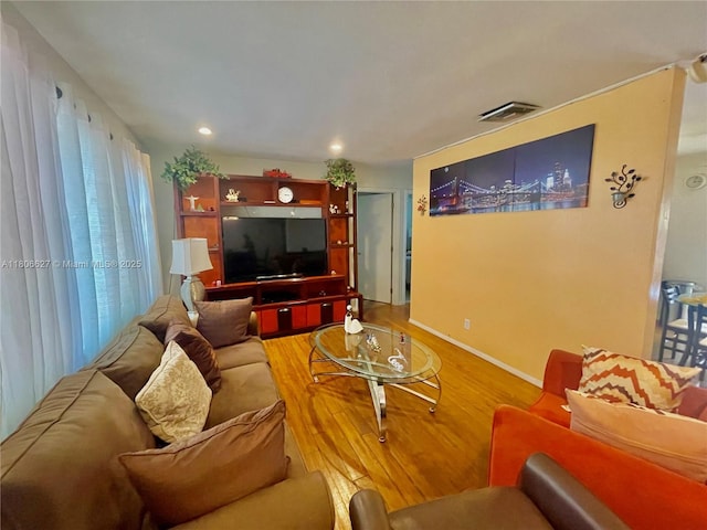 2465 NE 15th Ave, Pompano Beach, FL 33064 - living room with wood finished floors, recessed lighting, and baseboards