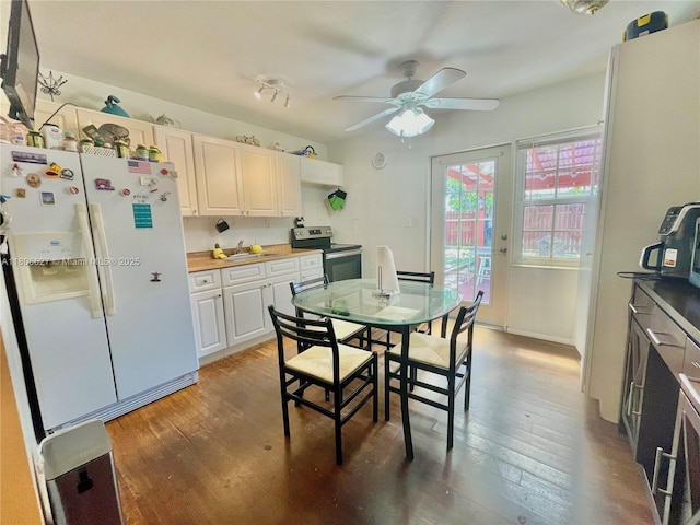 2465 NE 15th Ave, Pompano Beach, FL 33064 - dining room with a ceiling fan and wood finished floors