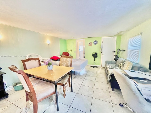 2465 NE 15th Ave, Pompano Beach, FL 33064 - dining space featuring light tile patterned floors