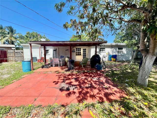 2465 NE 15th Ave, Pompano Beach, FL 33064 - back of house featuring a patio
